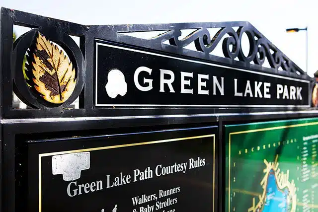 Living in Green Lake, Seattle: 2026 Neighborhood & Real Estate Guide 1 green lake park entrance sign path courtesy rules seattle 1