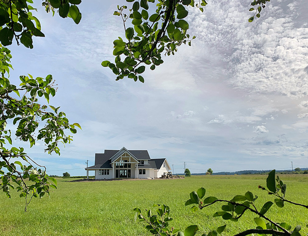 White modern farm house on Northside of Camano Island WA