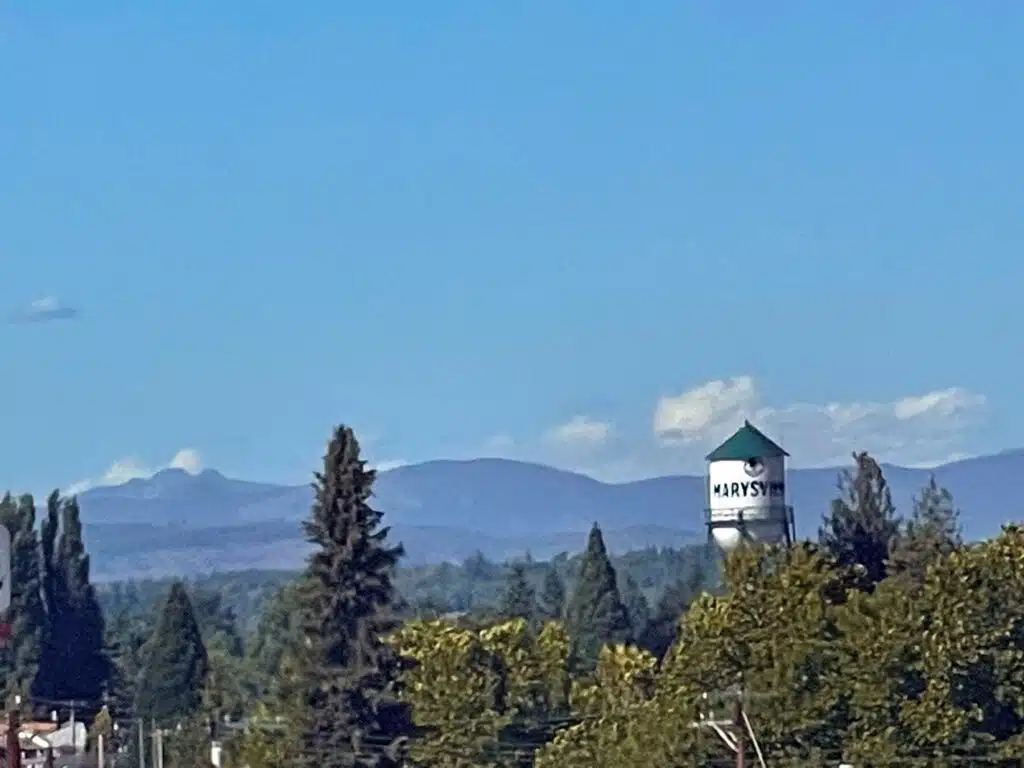 The historic Marysville water tower with Cascade Mountains in the background, Washington