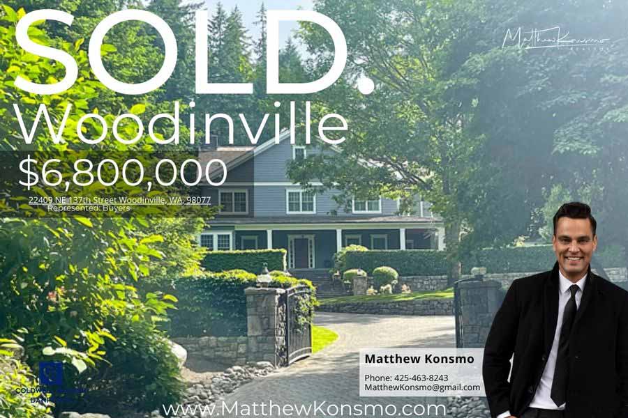 Sold marketing graphic for a Woodinville luxury estate at Lake of the Woods, 22409 NE 137th Street, Woodinville WA 98077 — gated estate with shake-and-stone manor, lush landscaping, and entry pillars, sold at $6,800,000 with buyer representation by Matthew Konsmo, broker with Coldwell Banker Danforth.