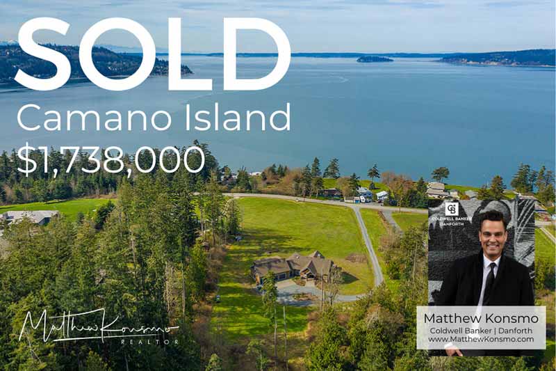Sold marketing graphic for an Arrowhead Road Camano Island waterfront estate at $1,738,000 — aerial view of luxury home on private acreage with sweeping Saratoga Passage water views, professionally represented and sold by Matthew Konsmo, broker with Coldwell Banker Danforth.